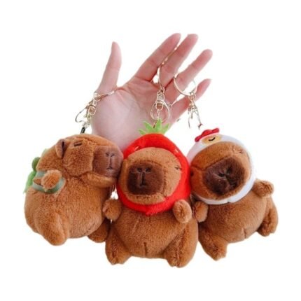 Capybara plush keyring with turtle, strawberry and chicken costumes